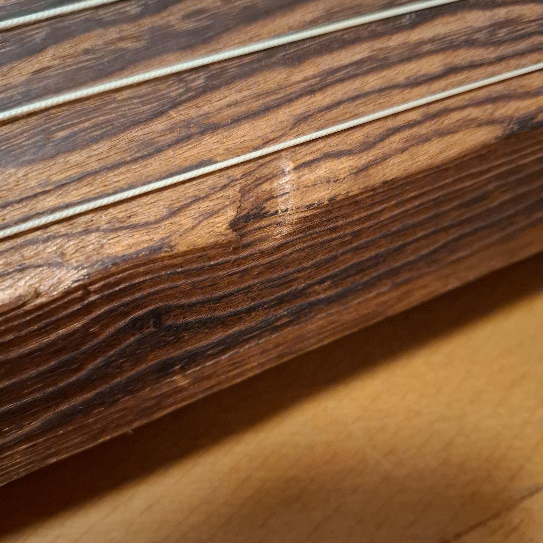 オレンジ色の鶴模様の袋つき　　　お琴